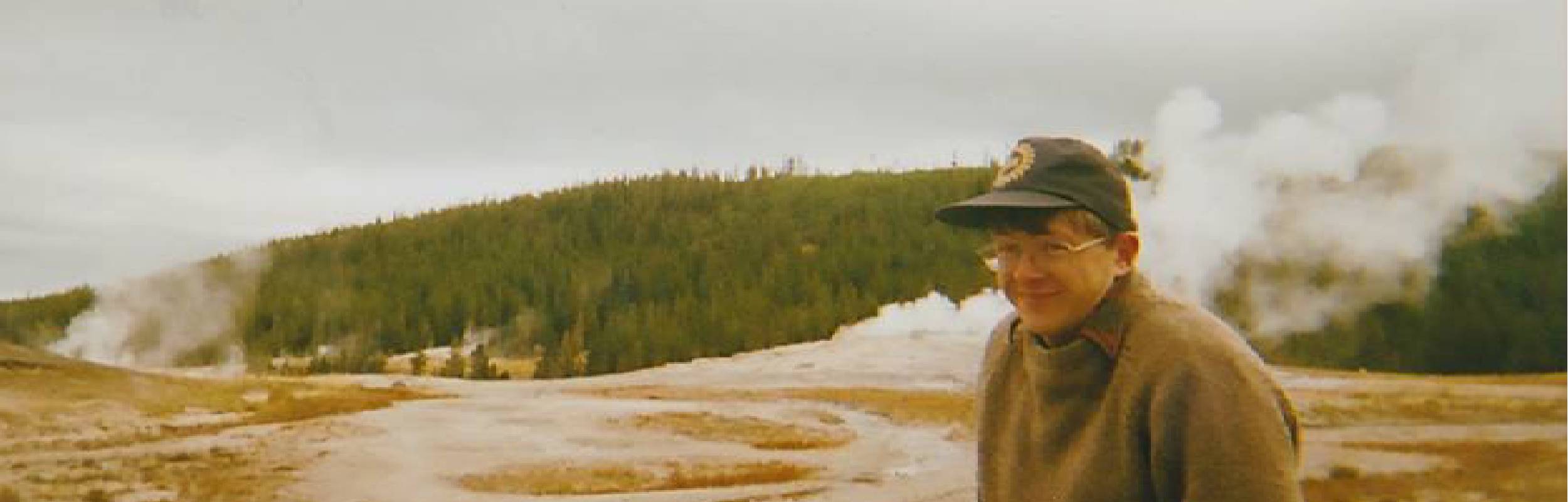 Blurry image of Sam at Old Faithful