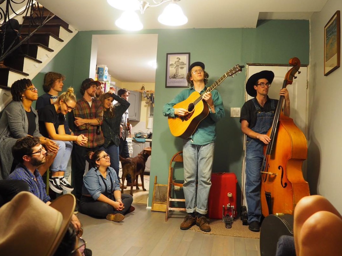 Sam Steffen playing guitar at houseshow in Philadelphia PA